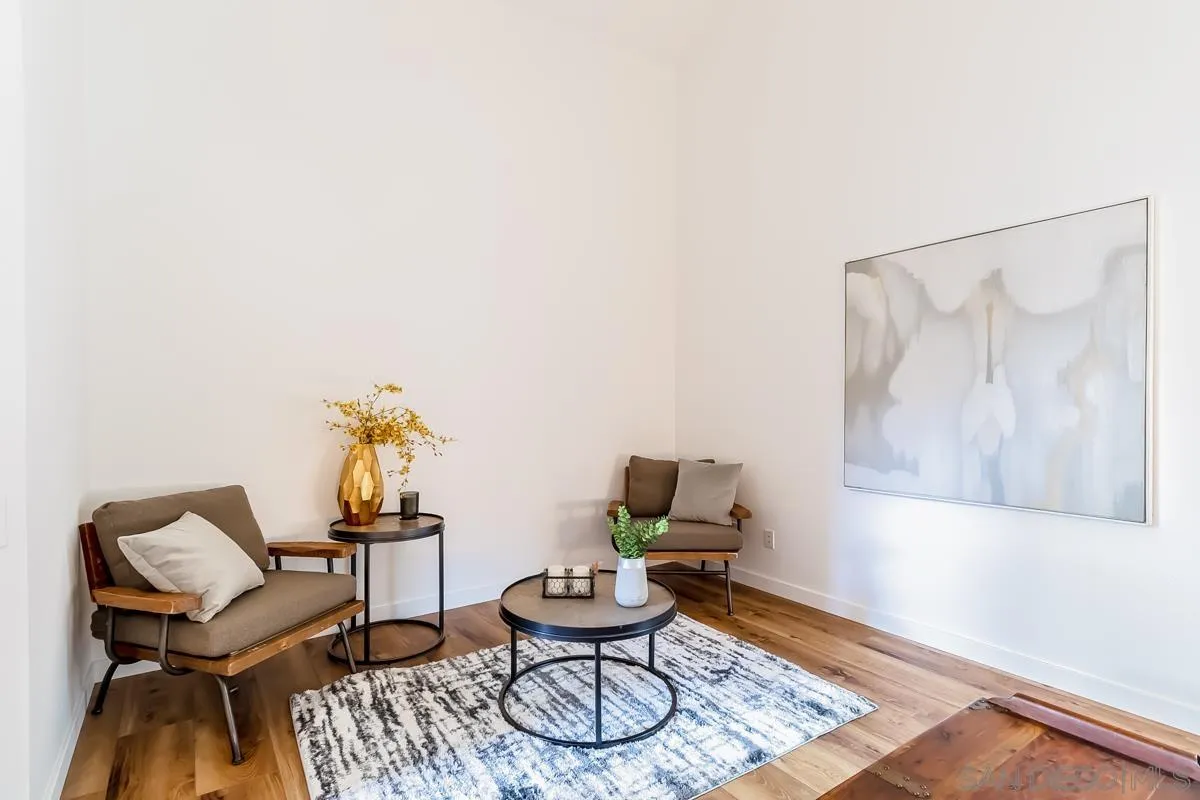 2710 Fernglen Road Carlsbad, CA 92008 - Photo 11 of 37 a living room with furniture and a wooden floor