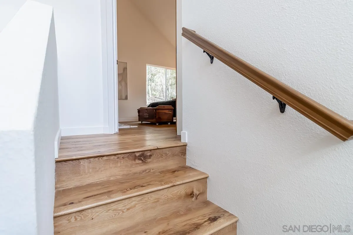 2710 Fernglen Road Carlsbad, CA 92008 - Photo 16 of 37 a view of entryway with wooden floor
