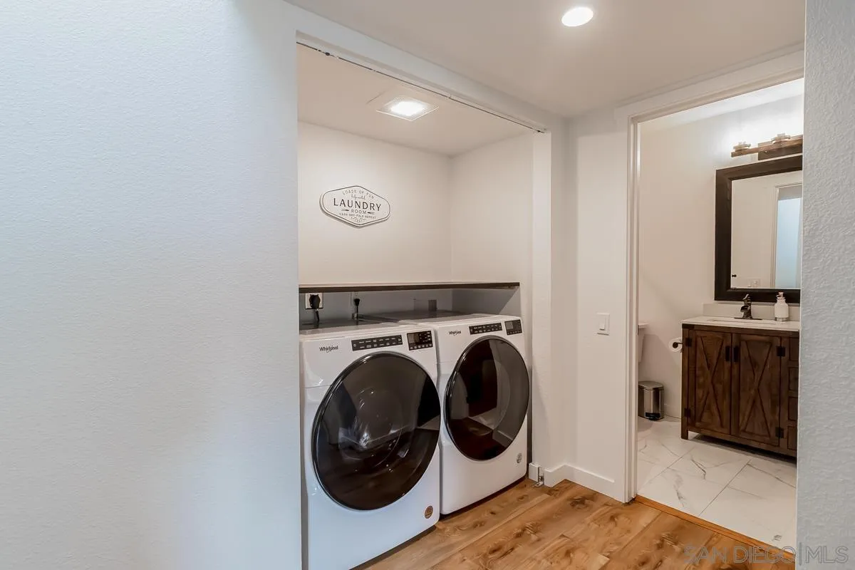 2710 Fernglen Road Carlsbad, CA 92008 - Photo 17 of 37 a en suite bathroom with a sink and a mirror