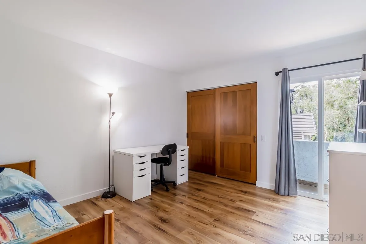 2710 Fernglen Road Carlsbad, CA 92008 - Photo 19 of 37 a view of a kitchen with furniture and wooden floor