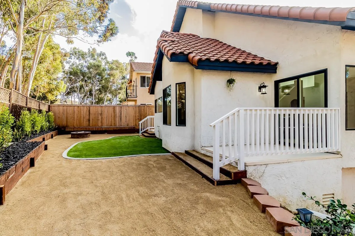 2710 Fernglen Road Carlsbad, CA 92008 - Photo 27 of 37 a view of a house with a yard