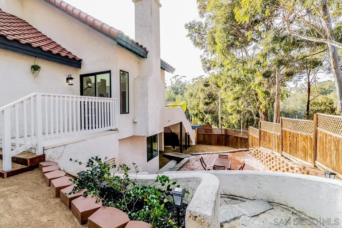 2710 Fernglen Road Carlsbad, CA 92008 - Photo 29 of 37 a view of a chair and table in backyard