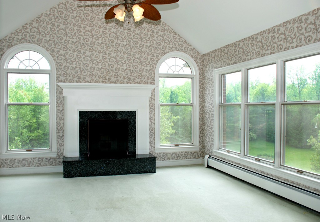 2890 Roundhill Road Akron, OH 44333 - Photo 15 of 25 SITTING ROOM OFF THE MASTER, FIREPLACE WITH GRANITE SURROUND, PANARAMIC VIEWS