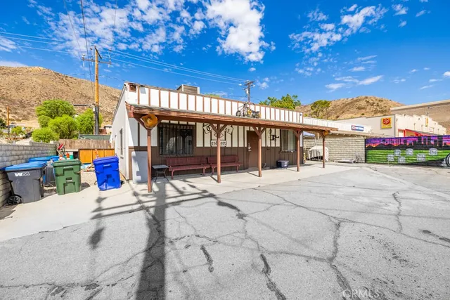 a view of an chairs and tables in the patio