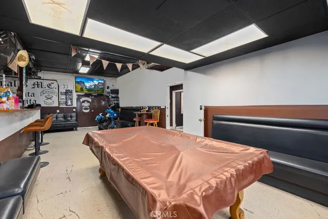 a room with table and chairs