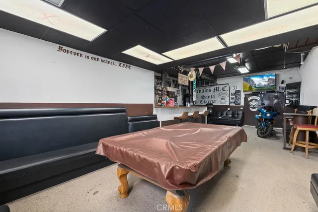 a view of a chairs and table in a room