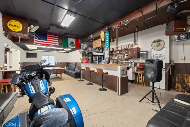 a view of a terrace with chairs and a mountain view