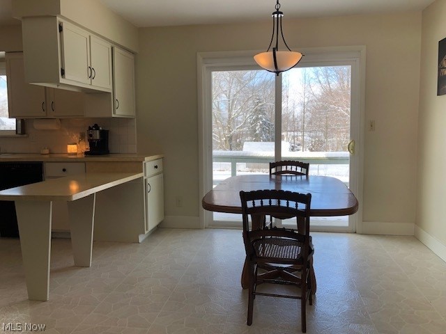 36533 Ridge Road Willoughby, OH 44094 - Photo 4 of 17 Large dinette with new sliding glass doors that open to a two tiered deck and fenced in backyard.