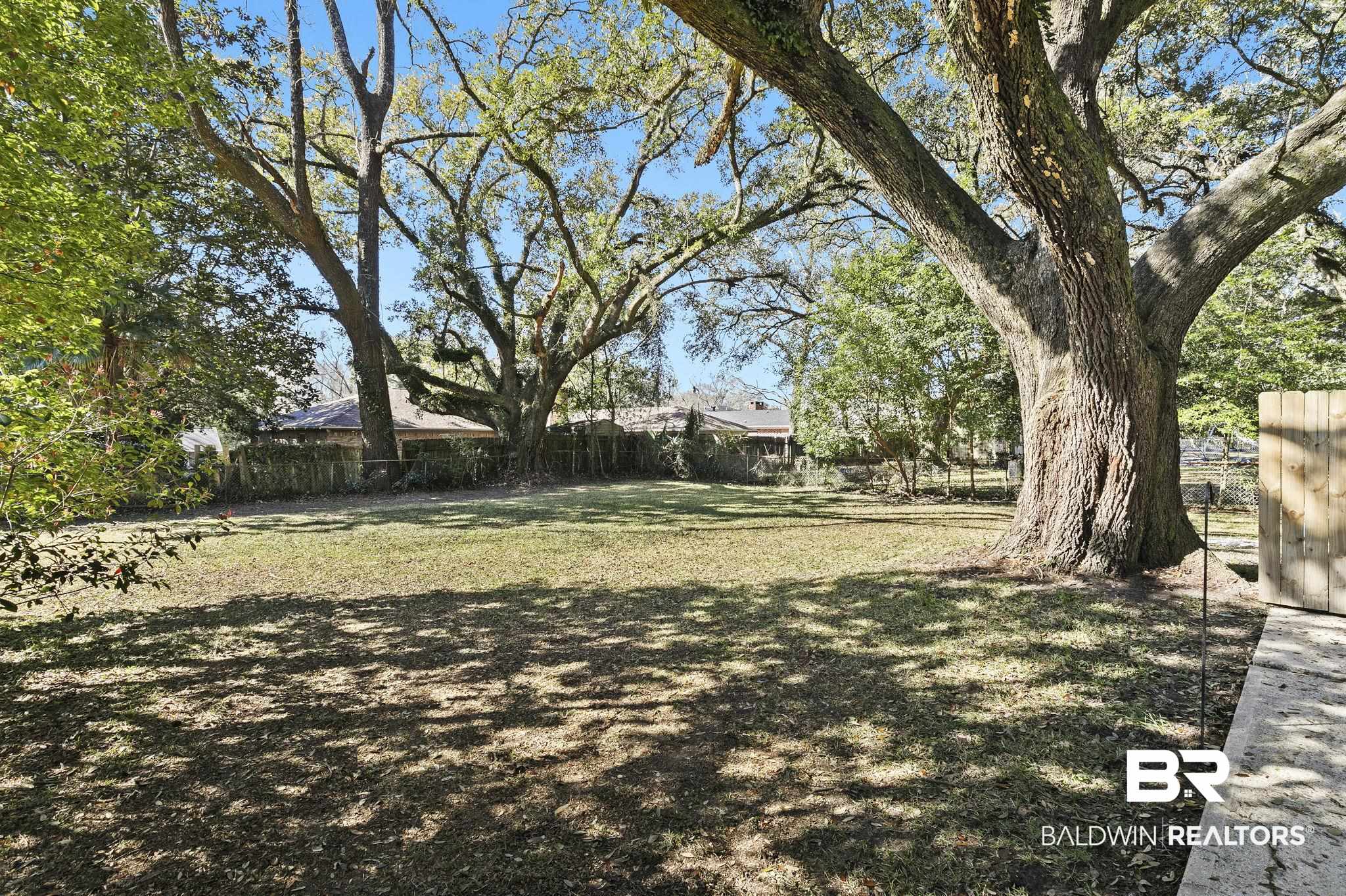 5817 Woodgate Road Mobile, AL 36609 - Photo 75 of 85 View of yard with fence