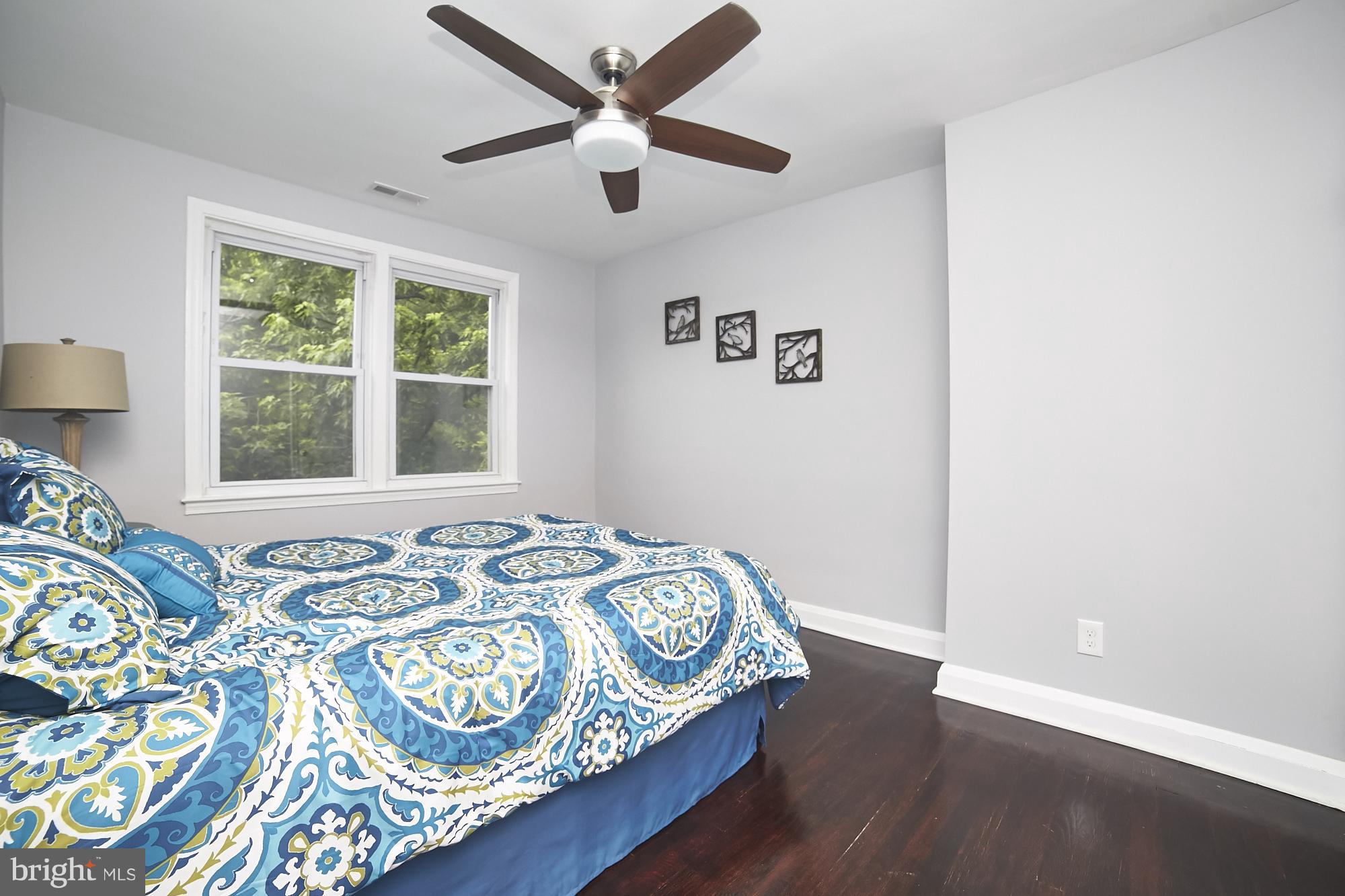 3814 Elkader Road Baltimore, MD 21218 - Photo 12 of 30 a bedroom with a bed and a window