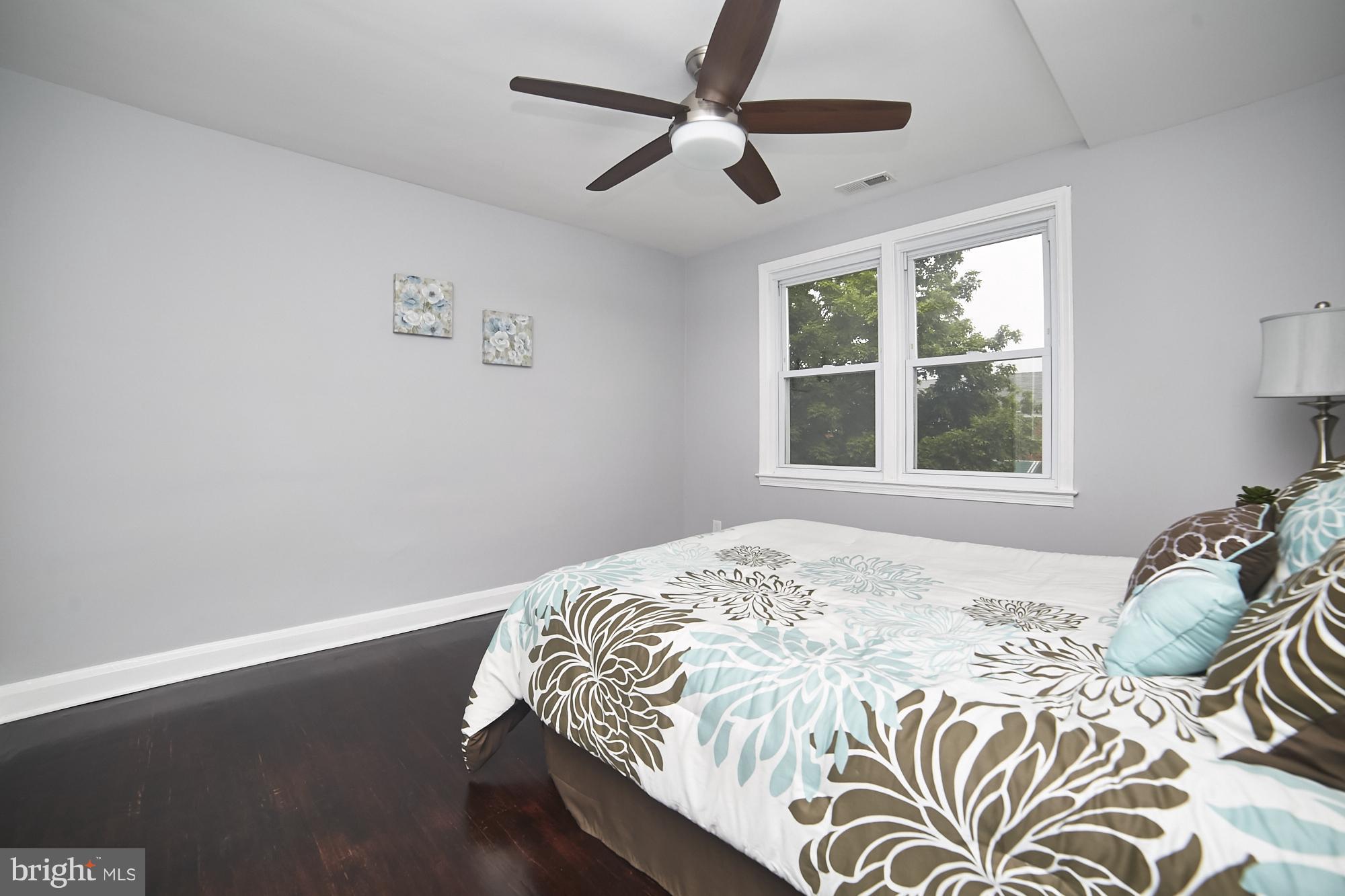 3814 Elkader Road Baltimore, MD 21218 - Photo 22 of 30 a bedroom with a bed and a window