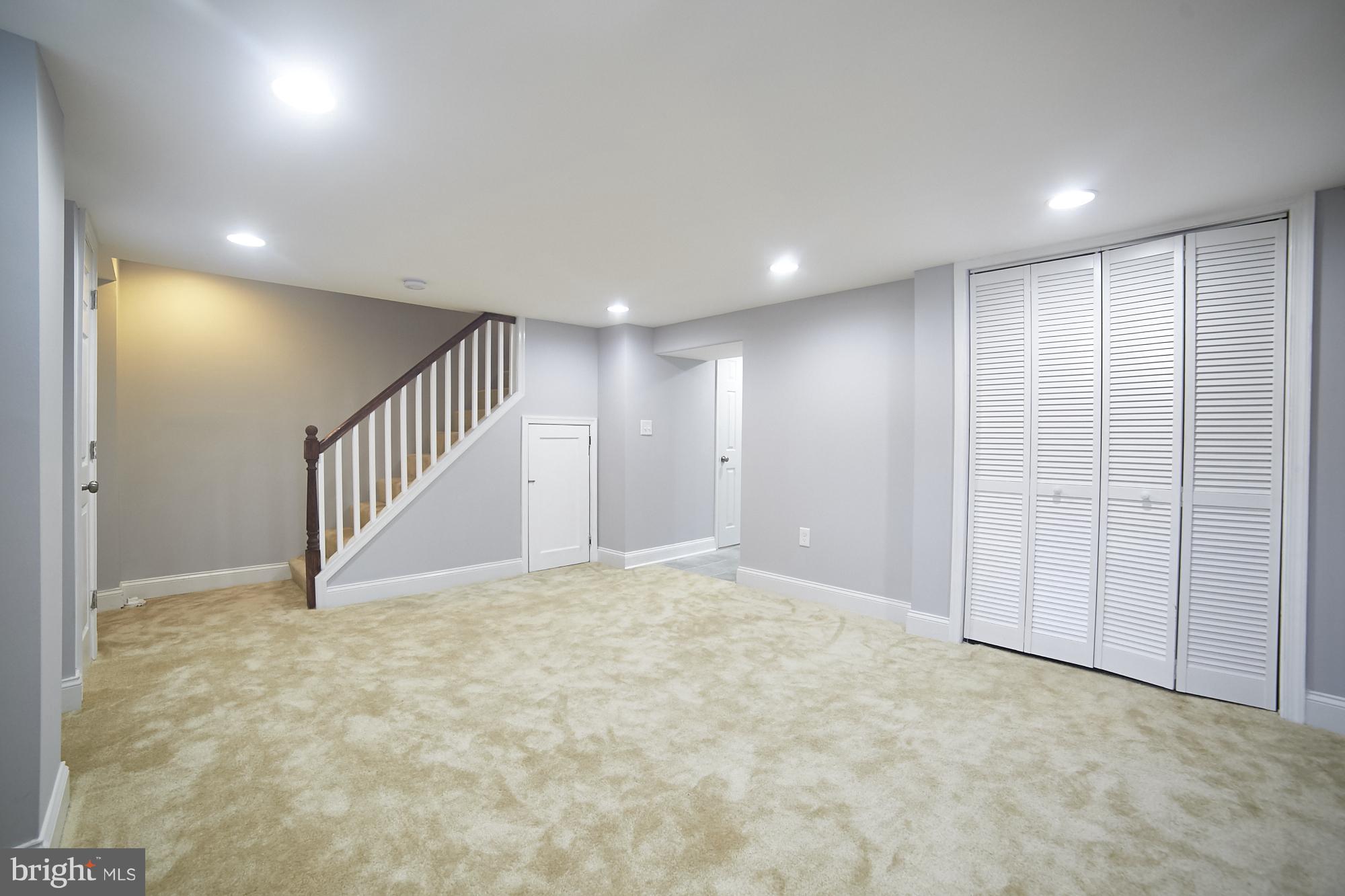 3814 Elkader Road Baltimore, MD 21218 - Photo 25 of 30 a view of an empty room with stairs