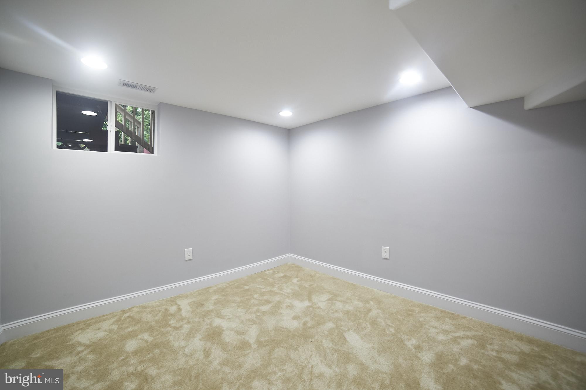 3814 Elkader Road Baltimore, MD 21218 - Photo 27 of 30 an empty room with a natural light