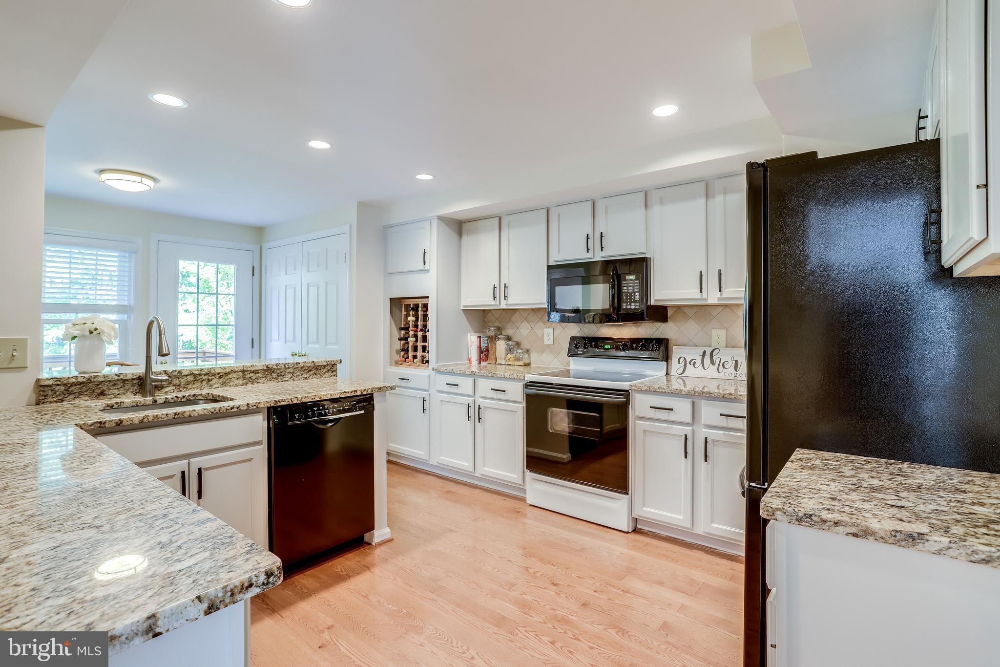1512 Deer Point Way Reston, VA 20194 - Photo 12 of 84 White Shaker cabinets, updated appliances