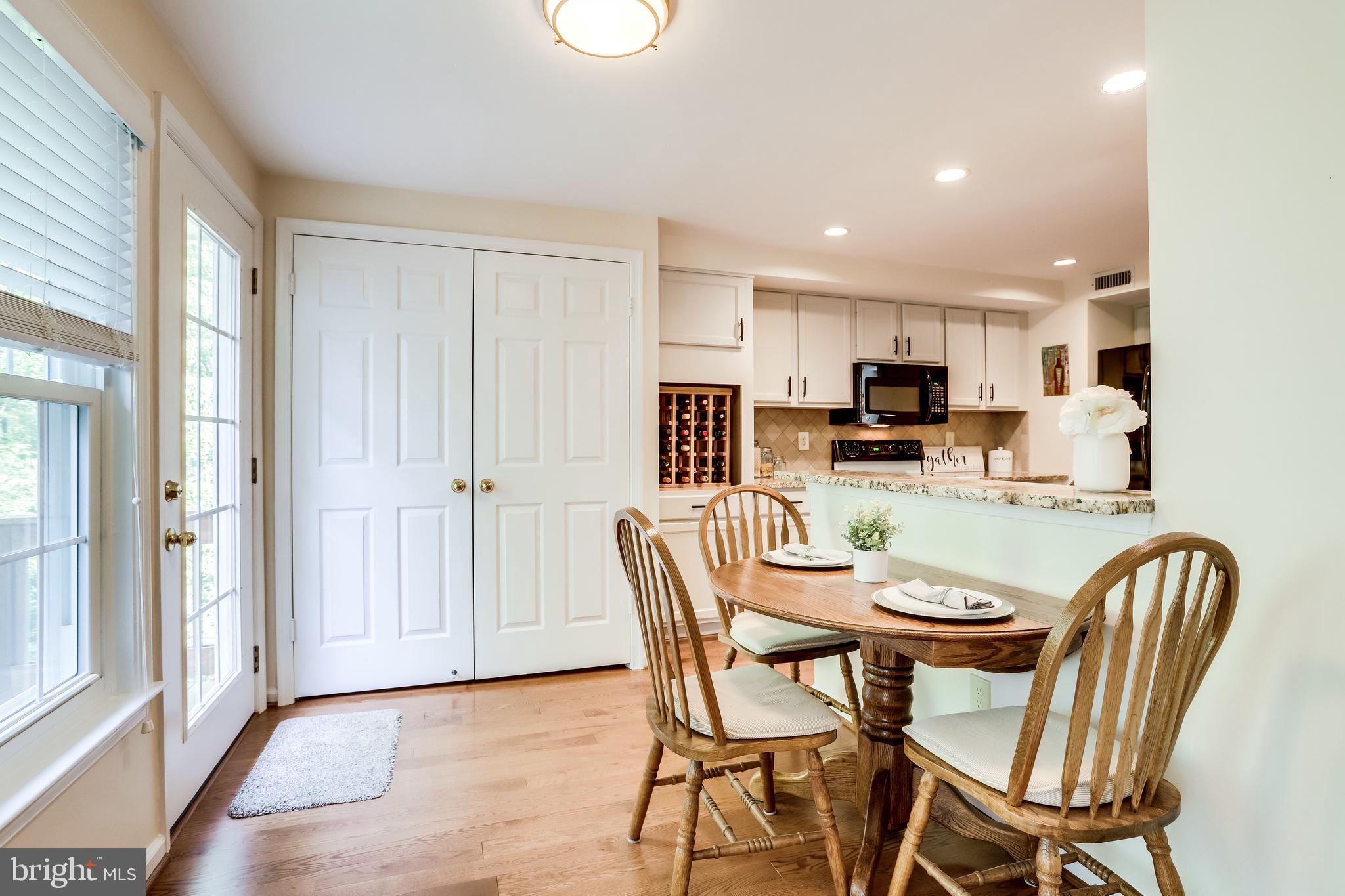 1512 Deer Point Way Reston, VA 20194 - Photo 16 of 84 Kitchen breakfast room opens to deck