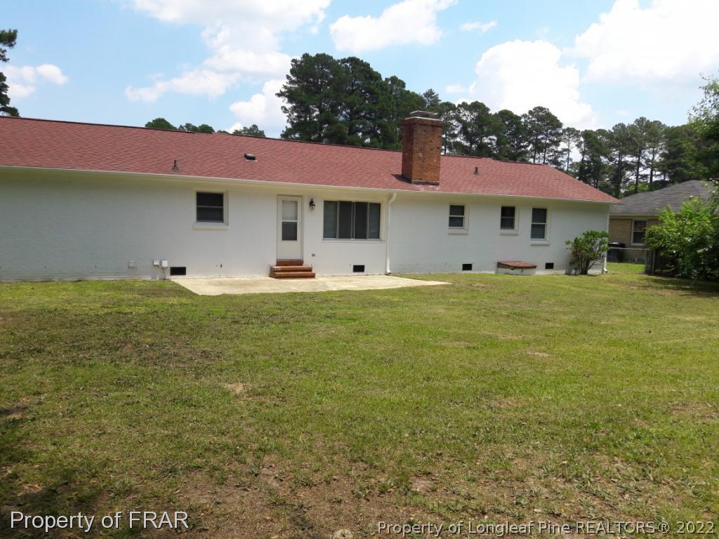 821 Bedford Road Fayetteville, NC 28303 - Photo 14 of 14 a large tree in front of the house