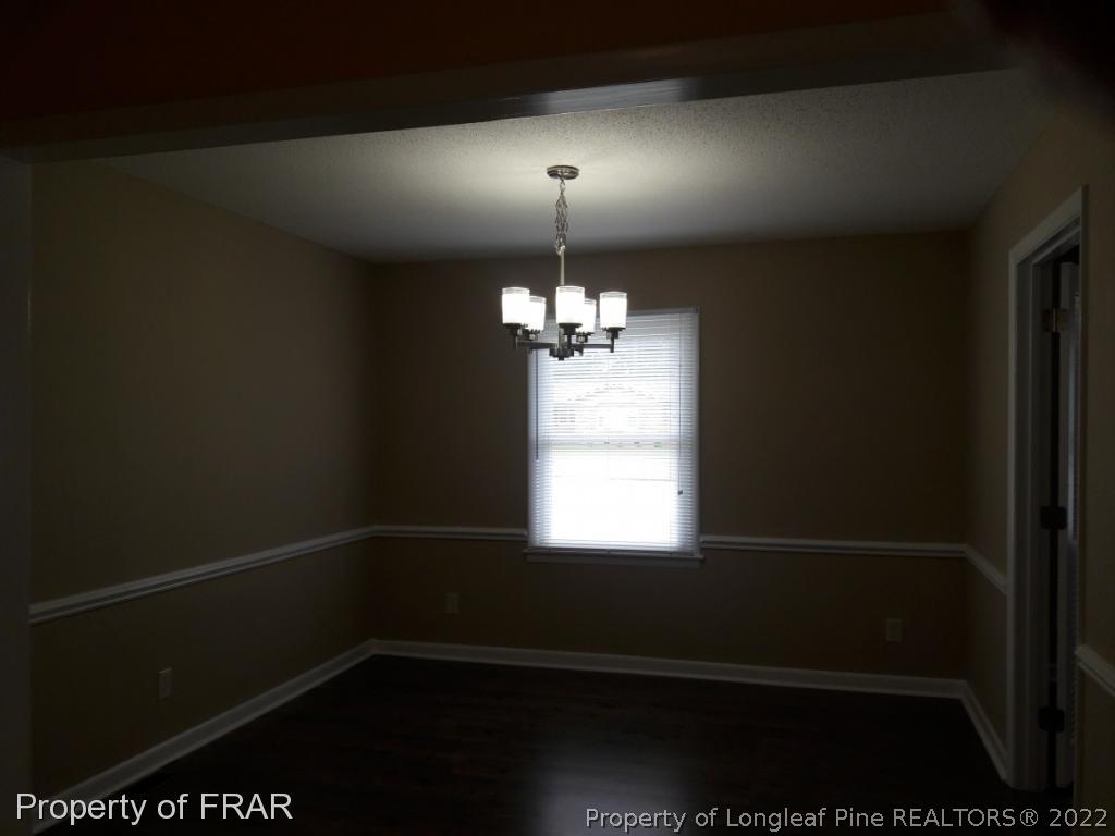 821 Bedford Road Fayetteville, NC 28303 - Photo 5 of 14 a view of empty room with window