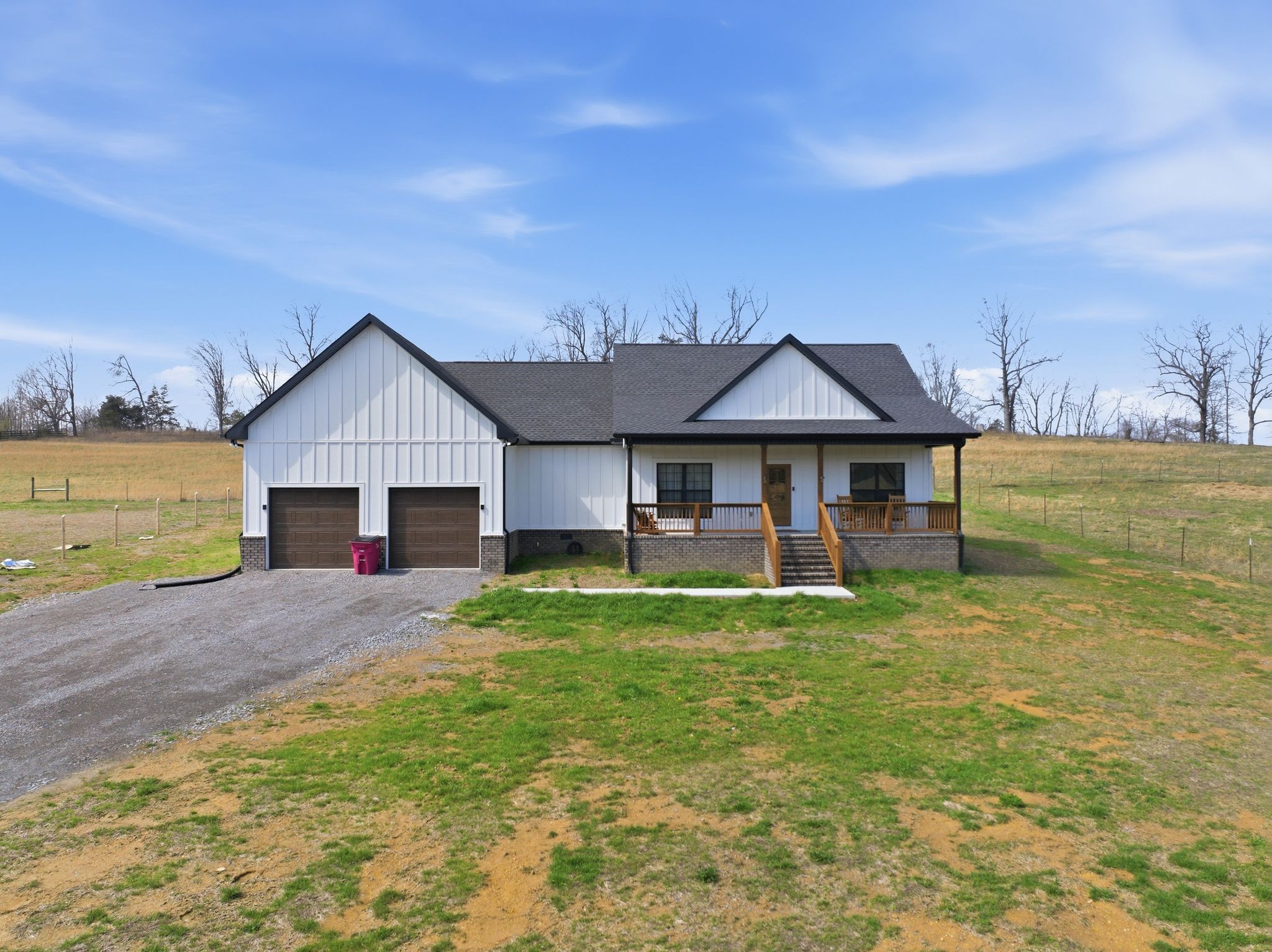 638 Howell Road Westmoreland, TN 37186 - Photo 1 of 41 a front view of a house with a yard