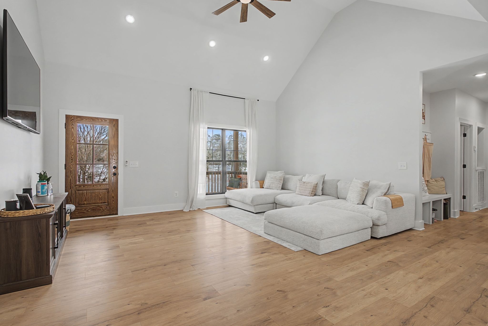 638 Howell Road Westmoreland, TN 37186 - Photo 12 of 41 a living room with furniture window and a flat screen tv