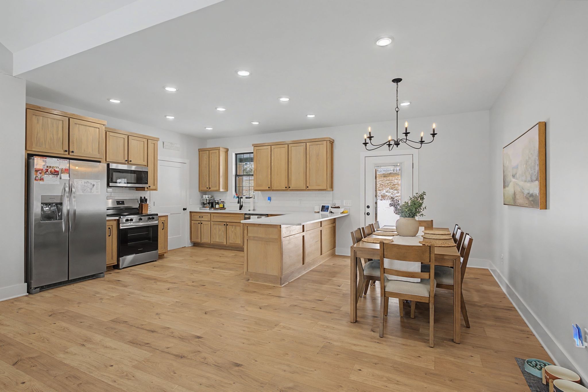 638 Howell Road Westmoreland, TN 37186 - Photo 13 of 41 a kitchen with a refrigerator and chairs