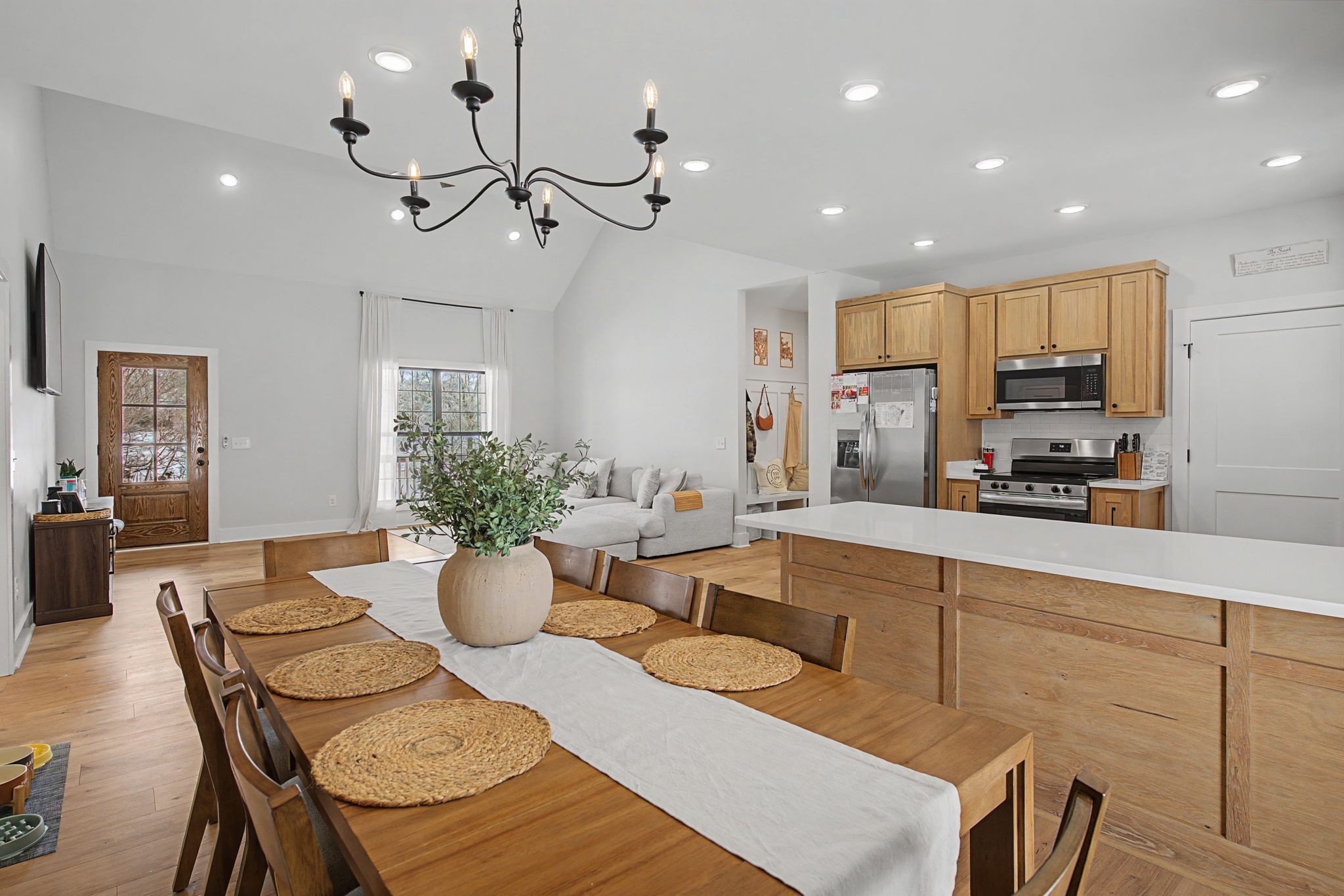 638 Howell Road Westmoreland, TN 37186 - Photo 14 of 41 a view of a dining room and kitchen island with furniture