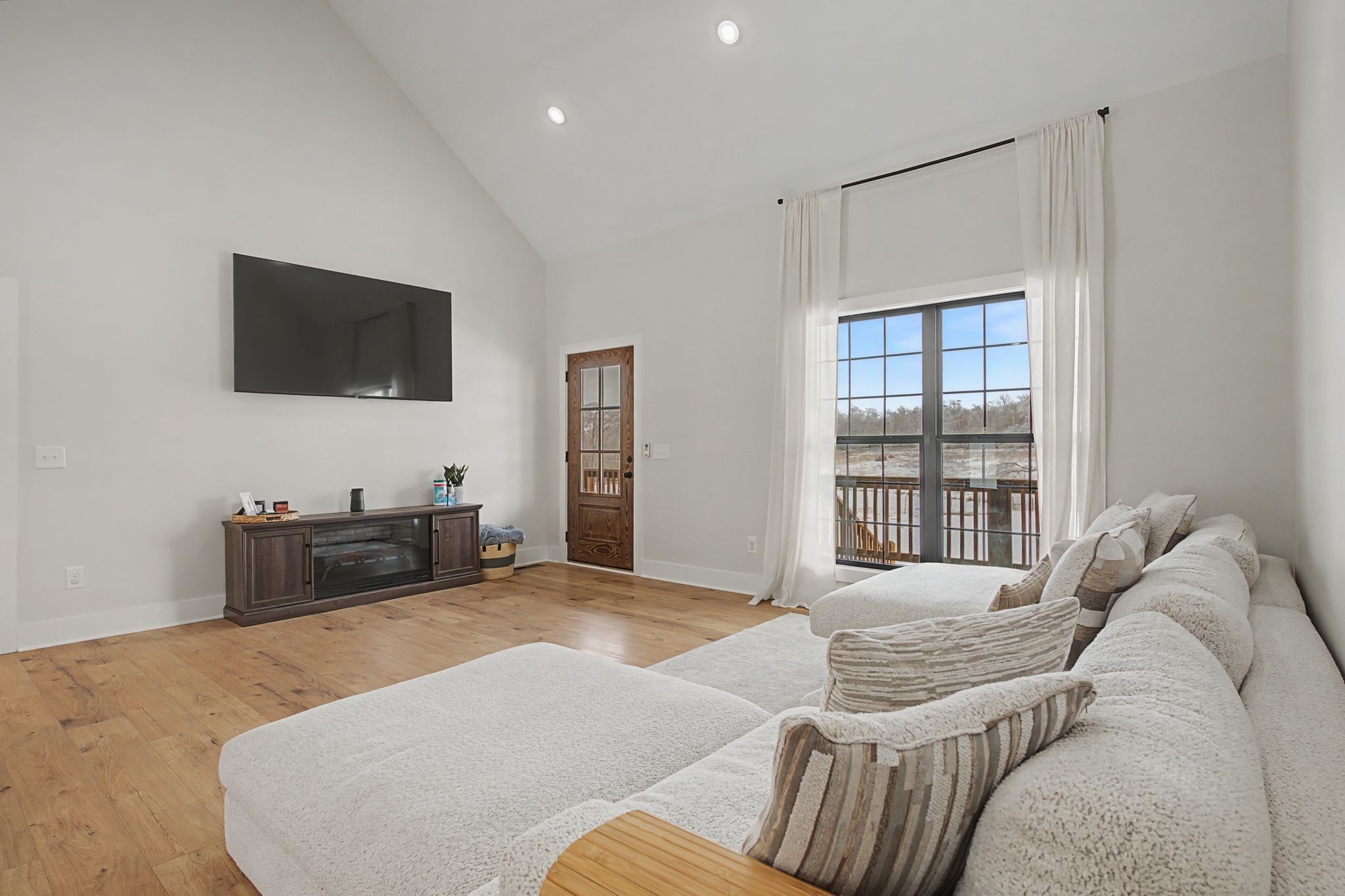 638 Howell Road Westmoreland, TN 37186 - Photo 15 of 41 a bedroom with a bed and a flat screen tv