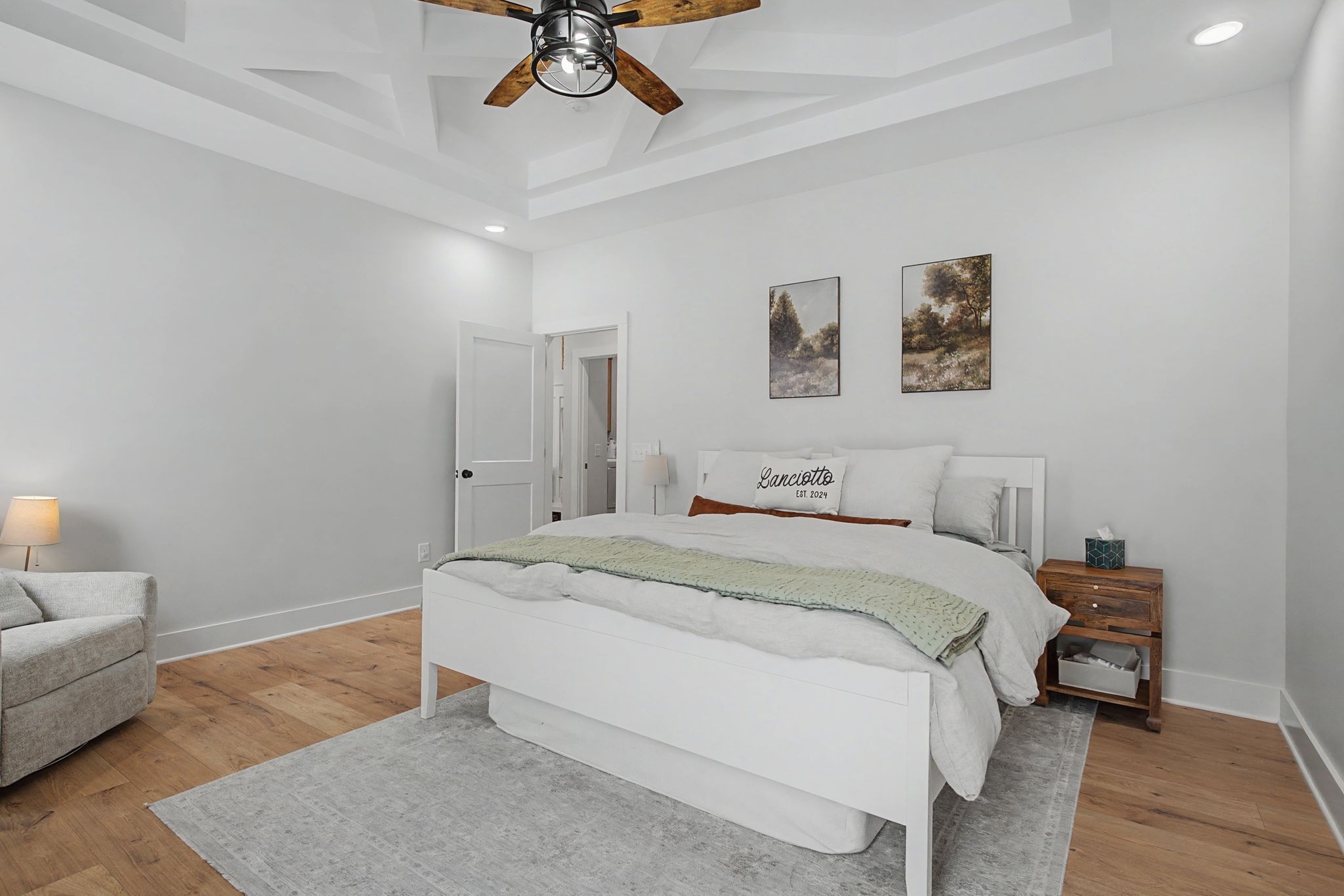 638 Howell Road Westmoreland, TN 37186 - Photo 30 of 41 a spacious bedroom with a bed and a couch