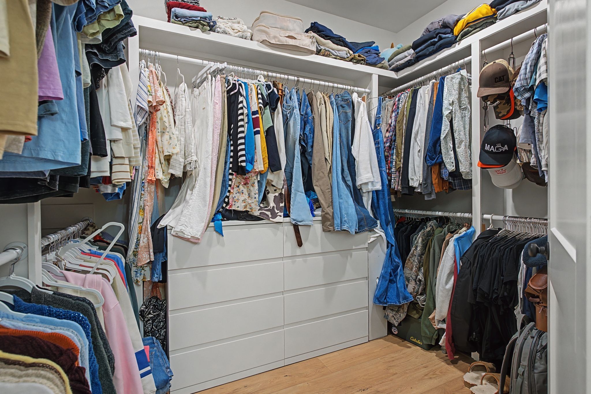 638 Howell Road Westmoreland, TN 37186 - Photo 33 of 41 a view of walk in closet with clothes and shoes