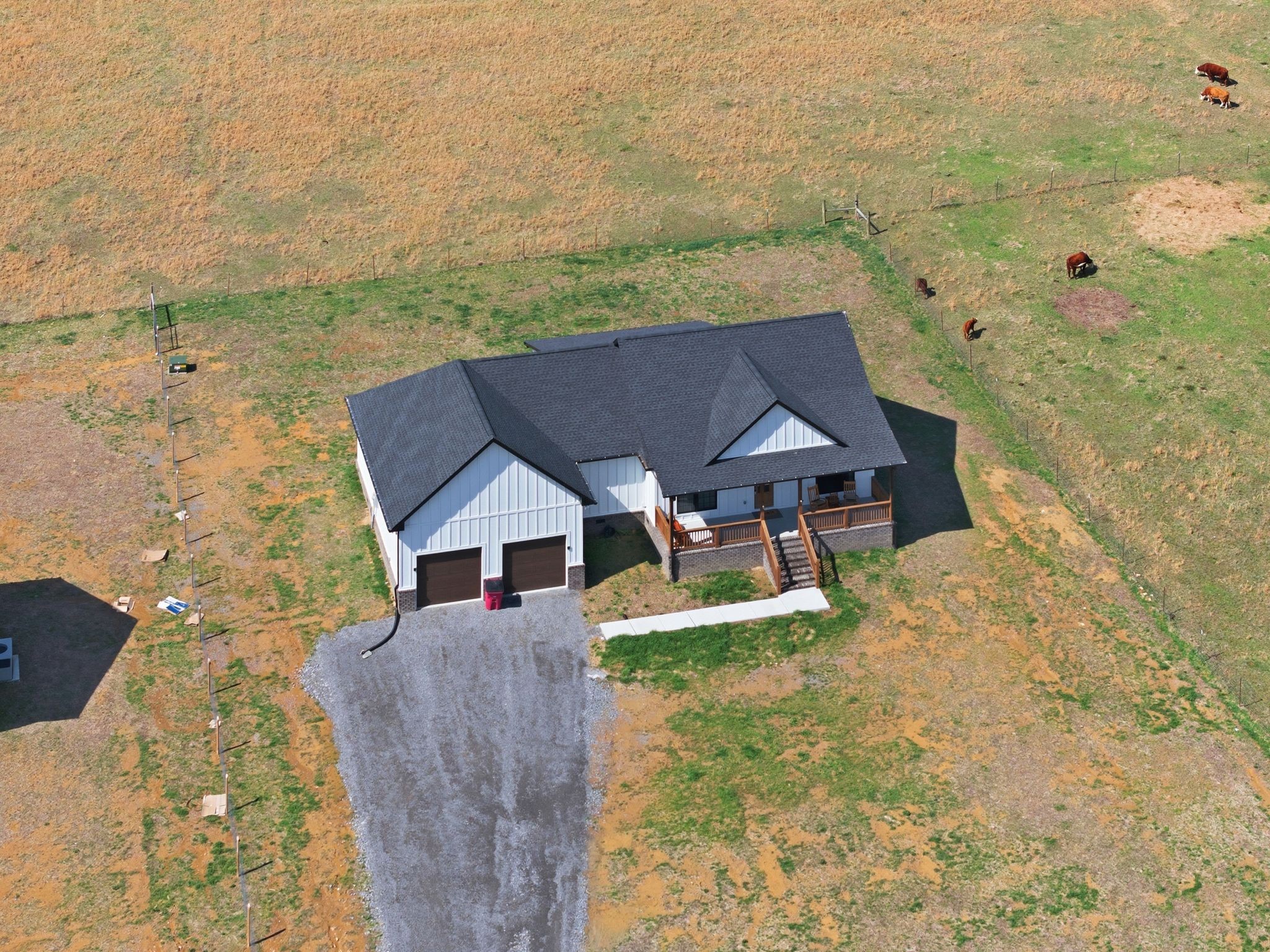 638 Howell Road Westmoreland, TN 37186 - Photo 36 of 41 an aerial view of a house with swimming pool and large trees