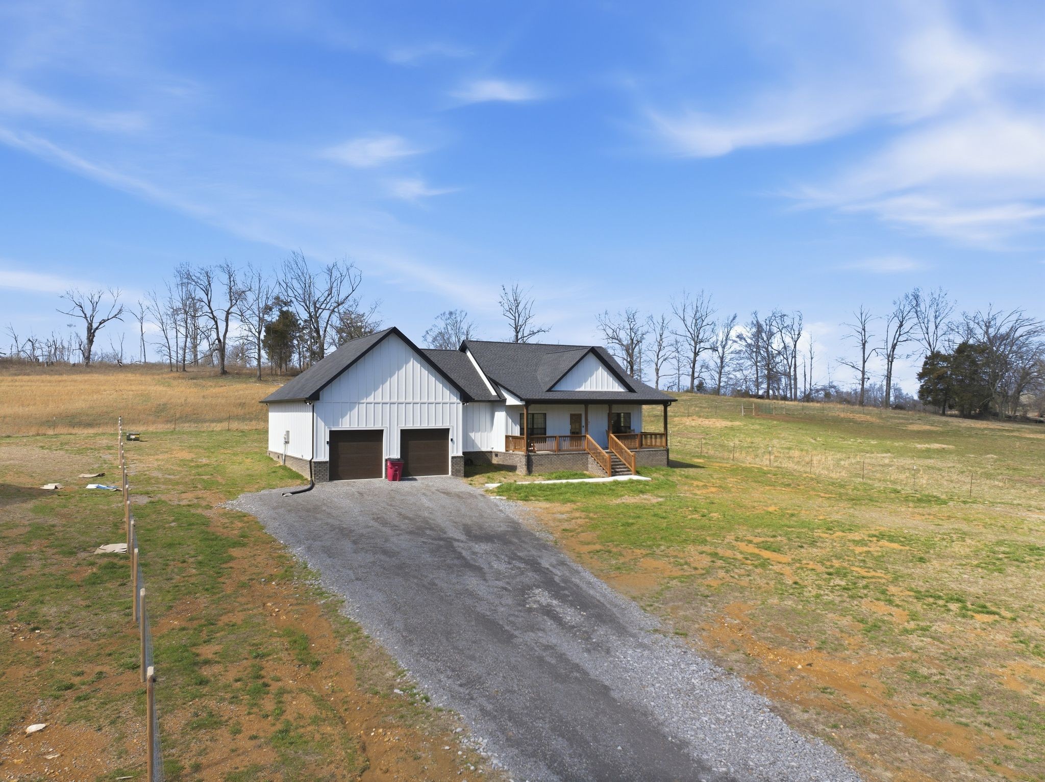 638 Howell Road Westmoreland, TN 37186 - Photo 6 of 41 a front view of a house with a yard