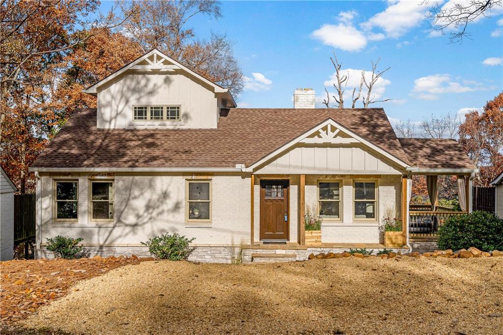 399 Lofton Road Northwest Atlanta, GA 30309 - Photo 1 of 1 front view of a house with a yard