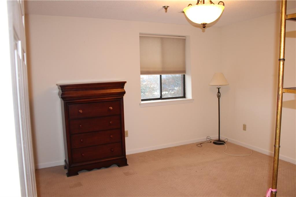 300 Johnson Ferry Road, Unit B802 Atlanta, GA 30328 - Photo 11 of 23 an empty room with windows