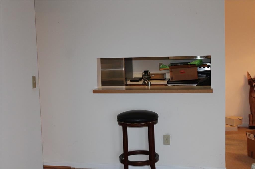 300 Johnson Ferry Road, Unit B802 Atlanta, GA 30328 - Photo 8 of 23 a view of dining room with furniture and wooden floor