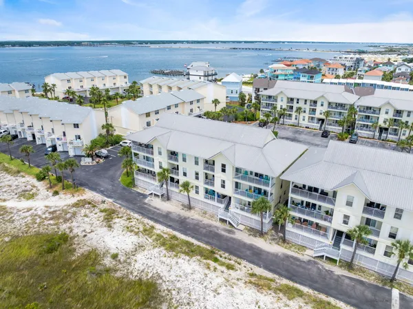 a view of building with an ocean
