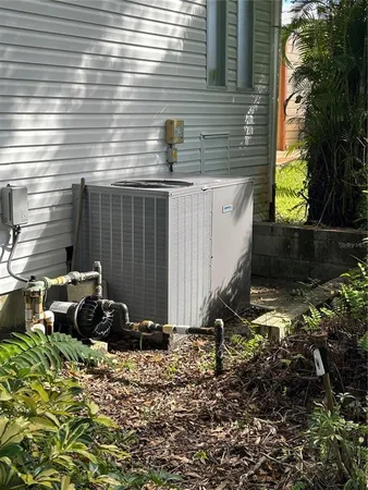 a view of a sign board with a yard