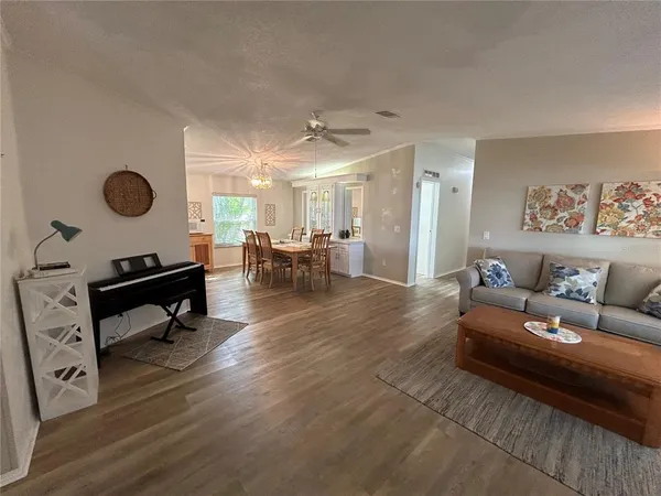 a living room with furniture and a table