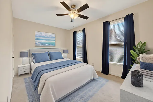 a view of an empty room with a fireplace