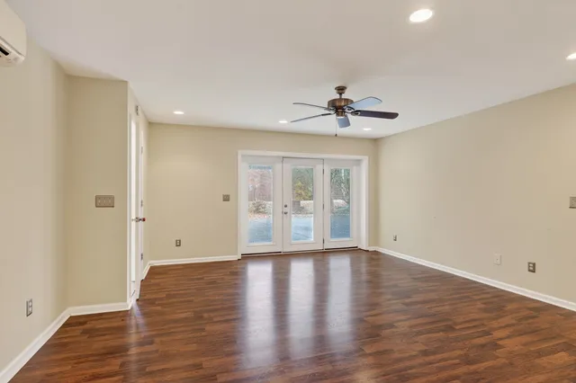 a view of entryway with wooden floor