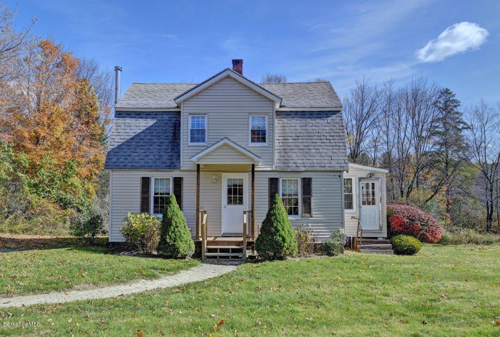 51 Anthony Road Richmond, MA 01201 - Photo 1 of 24 a front view of a house with a yard