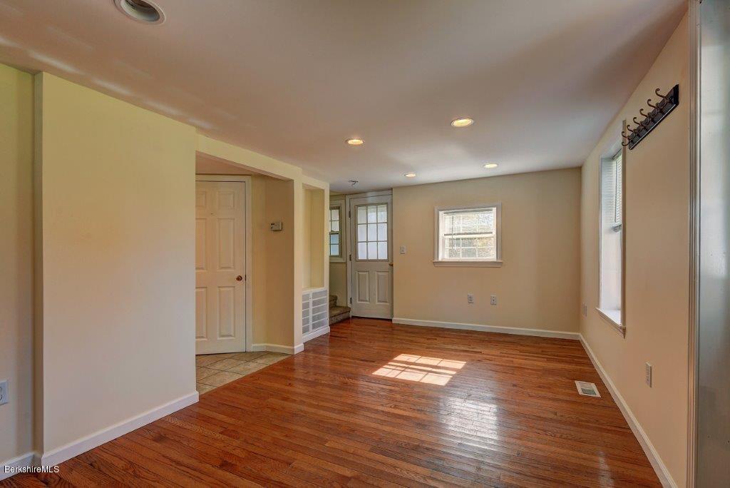51 Anthony Road Richmond, MA 01201 - Photo 12 of 24 a view of empty room with wooden floor and fan