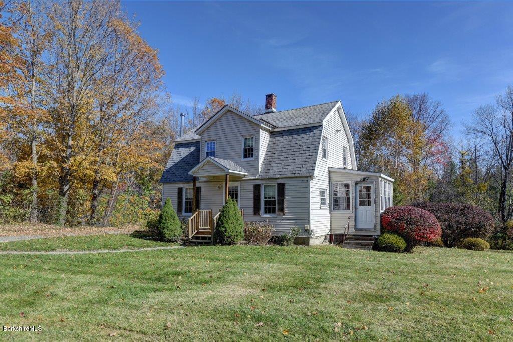 51 Anthony Road Richmond, MA 01201 - Photo 3 of 24 a front view of a house with garden