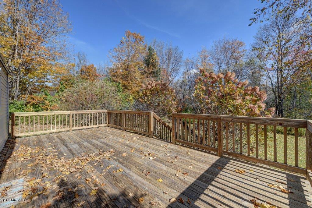 51 Anthony Road Richmond, MA 01201 - Photo 5 of 24 a view of a balcony with wooden fence