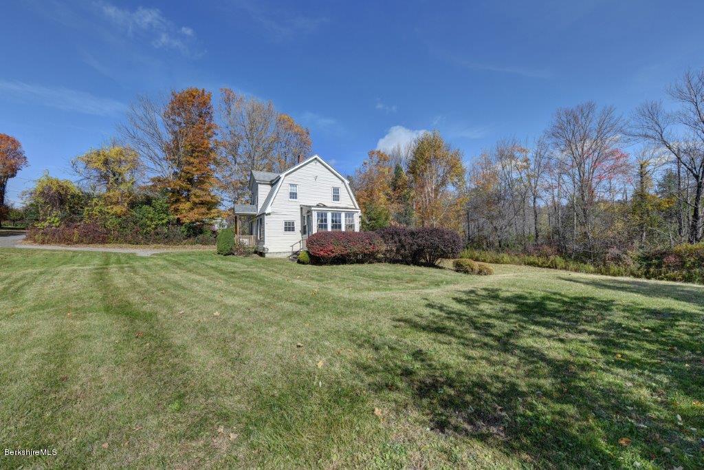 51 Anthony Road Richmond, MA 01201 - Photo 8 of 24 a view of a house with a yard