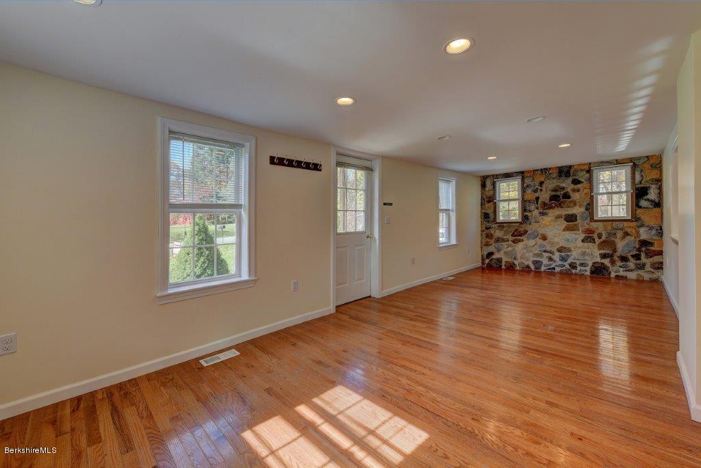 51 Anthony Road Richmond, MA 01201 - Photo 9 of 24 a view of empty room with wooden floor and window