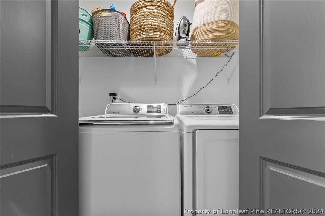 15420 Raccoon Run Road Wagram, NC 28396 - Photo 27 of 39 a utility room with dryer and washer