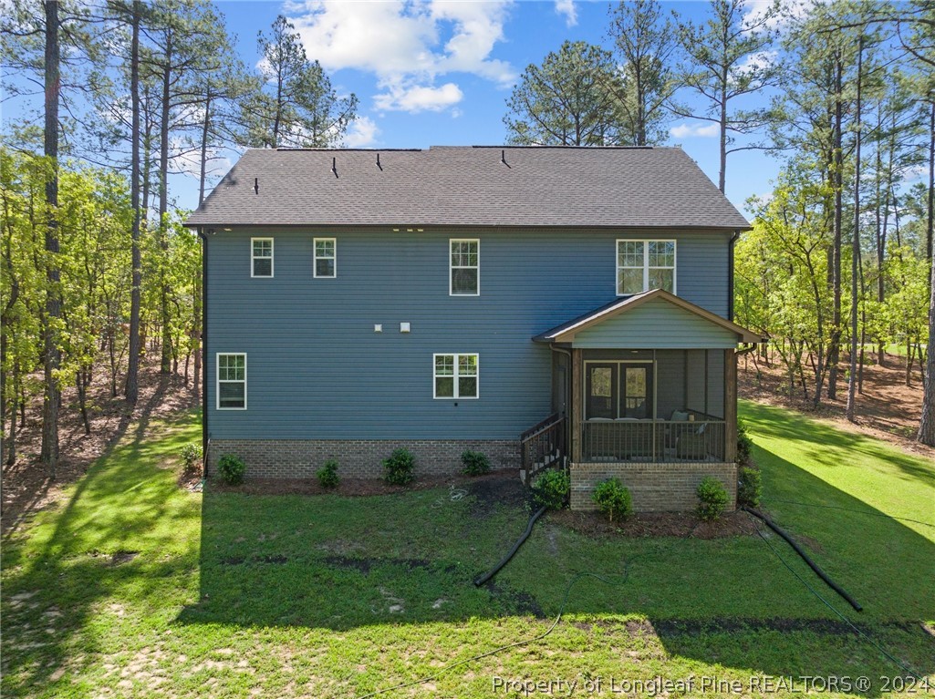 15420 Raccoon Run Road Wagram, NC 28396 - Photo 35 of 39 a aerial view of a house