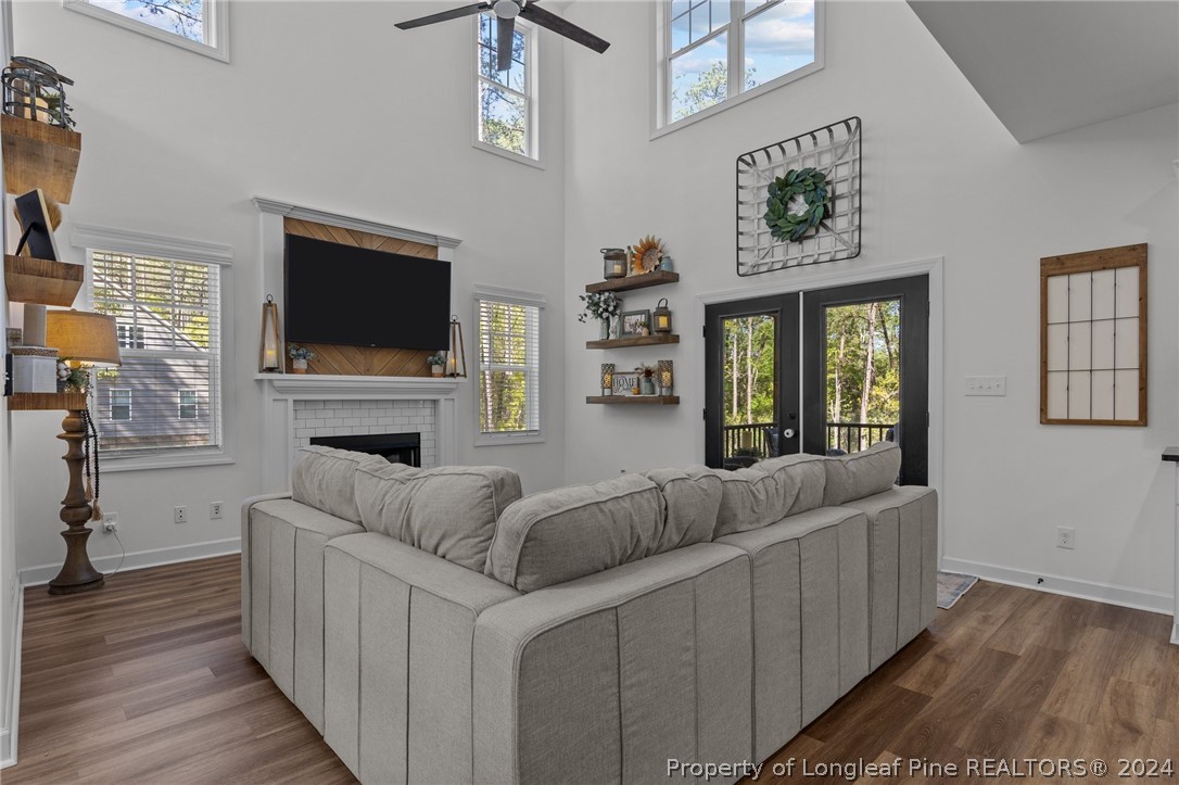 15420 Raccoon Run Road Wagram, NC 28396 - Photo 10 of 39 a living room with furniture and a flat screen tv