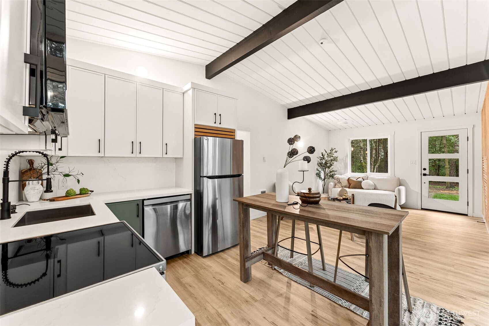 6198 Clover Valley Road Southeast Port Orchard, WA 98367 - Photo 11 of 34 a kitchen with a sink appliances and cabinets