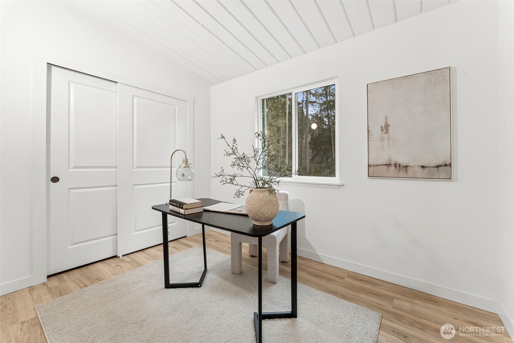 6198 Clover Valley Road Southeast Port Orchard, WA 98367 - Photo 15 of 34 a room that has a table and chairs in it