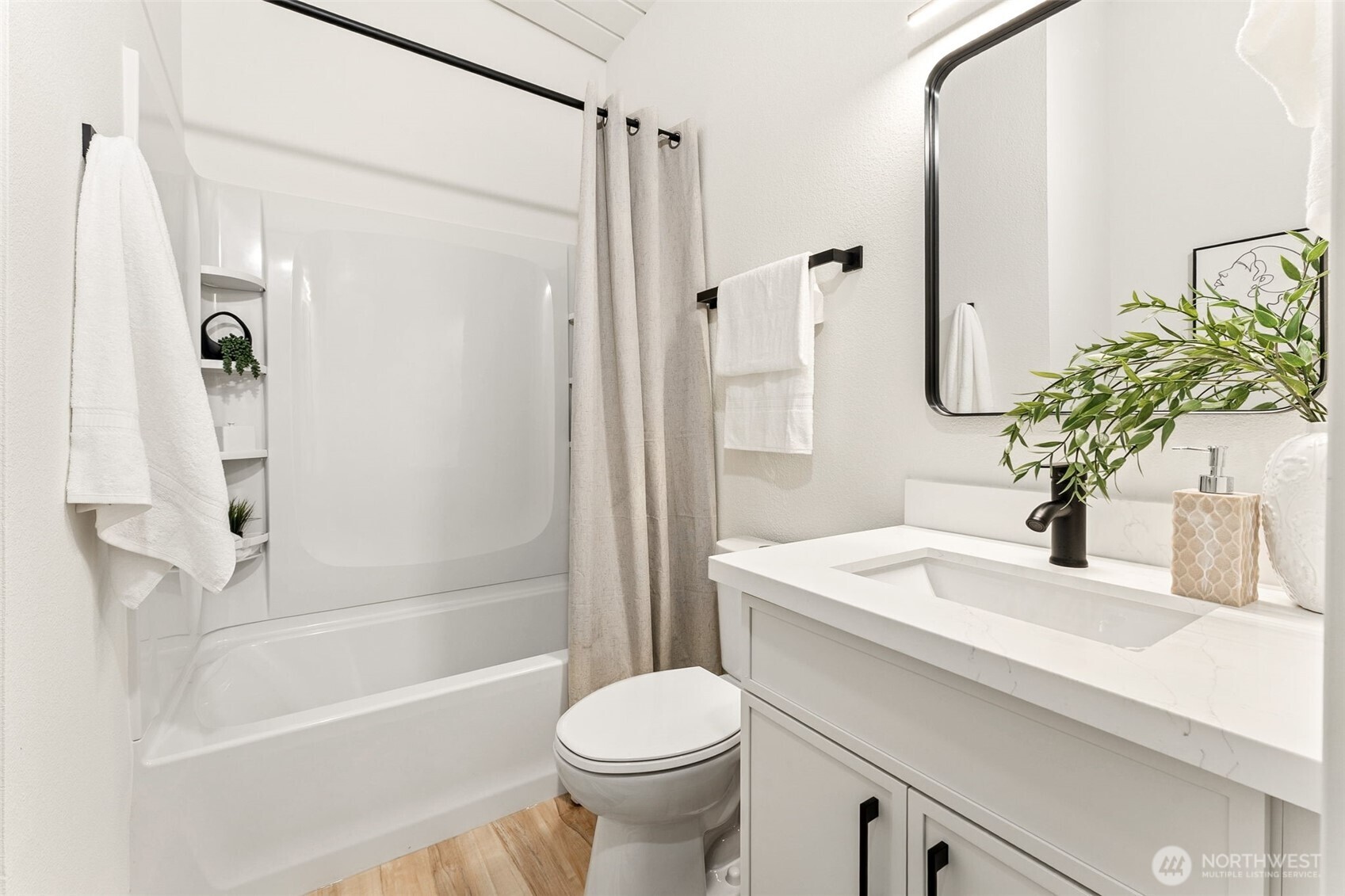 6198 Clover Valley Road Southeast Port Orchard, WA 98367 - Photo 16 of 34 a bathroom with a sink toilet and shower